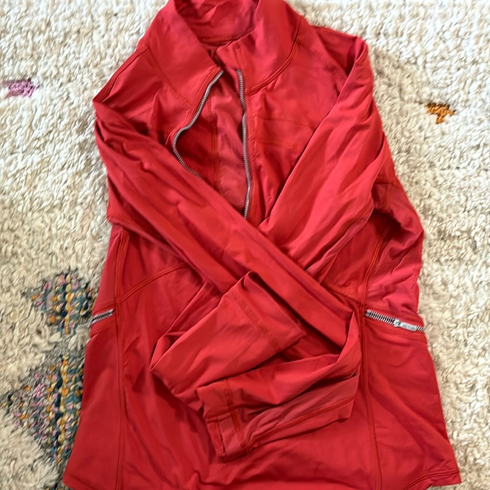 Lululemon 1/2 zip Energize Pullover.